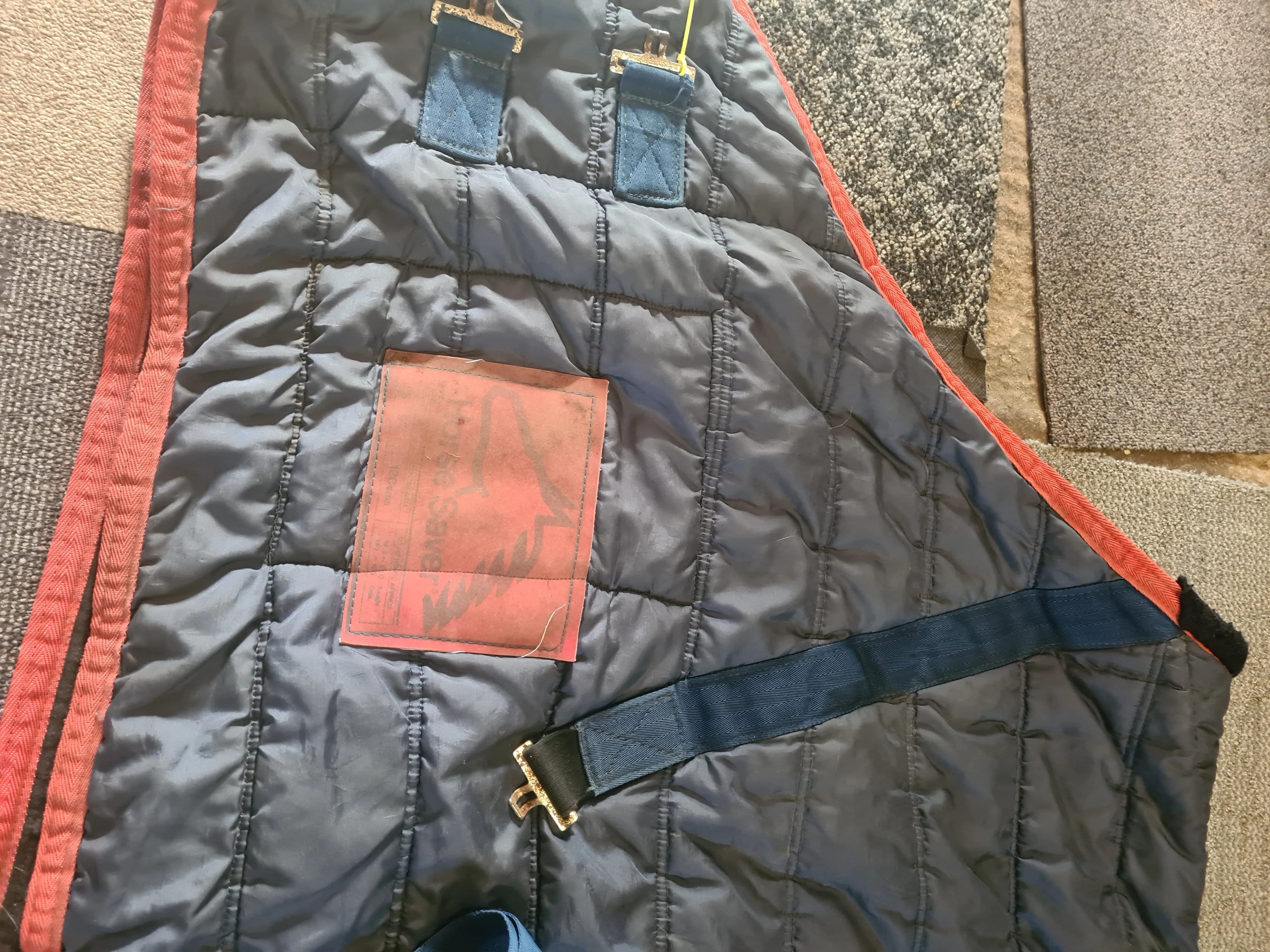 5'9 medium stable rug, few minor tears and repairs