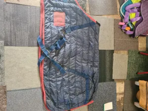 5'9 medium stable rug, few minor tears and repairs